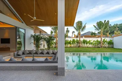 an external view of a villa with a swimming pool at V157 Brand New Beautiful Dream Villa in Kamala Beach