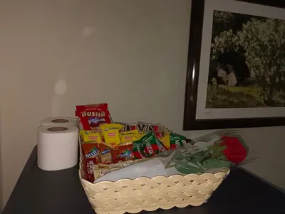 a basket of snacks sitting on a table at Patong tower mountain view m705 in Patong Beach