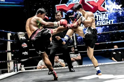 a group of people in a boxing match at OYA International Resort Phuket \u666e\u5409\u5c9b\u6b27\u96c5\u56fd\u9645\u5ea6\u5047\u9152\u5e97 in Phuket Town
