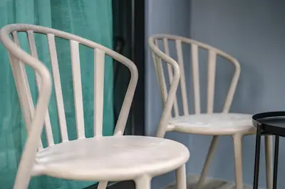 two white chairs sitting next to each other at C161 1Km to beach New City gate in Kamala Beach
