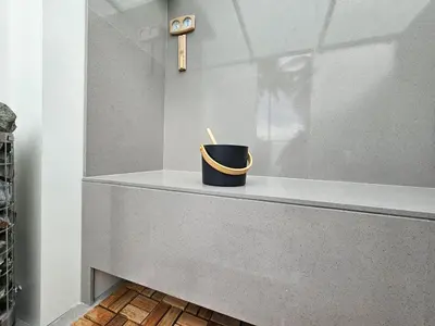 a candle sitting on a shelf in a room at Angsana Beachfront Residences in Phuket