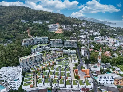 an aerial view of a city with buildings at Private Residents in Surin Mida in Surin Beach