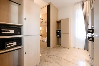 a room with a hallway with a bedroom at Noppharat Krabi Resort in Ao Nang Beach