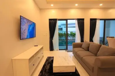 a living room with a couch and a table at V150 5-Star Villa Perfect for Relaxation &Comfort in Rawai Beach