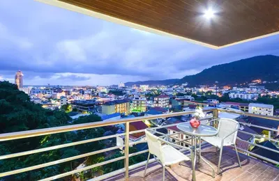 a balcony with a view of a city at Ocean and Mountainviews, 2 Balconies in Patong Beach