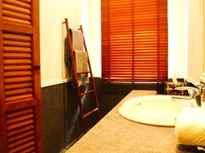 a bathroom with a sink and a towel ladder at 10 - Panoramic View on Ao Yon Beach in Ko Thanan