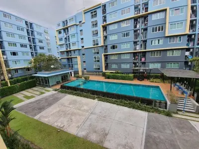 an overhead view of a swimming pool in front of a building at Dcondo Kathu Poolview by LaChambre Phuket in Phuket Town