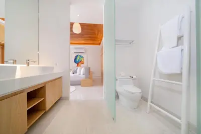 a bathroom with a toilet and a sink at New Build Masterpiece with Private Pool - 4BR Villa in Lux Pride 2 V7 Residence in Bang Tao Beach