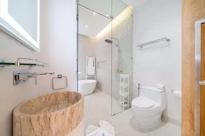 a bathroom with a tub and a toilet and a shower at New Build Masterpiece with Private Pool - 4BR Villa in Lux Pride 2 V7 Residence in Bang Tao Beach