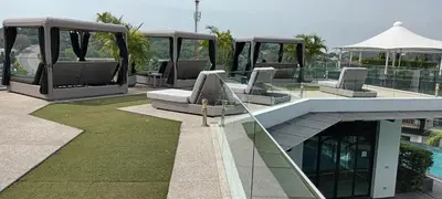 a group of chairs sitting on top of a building at Luxury spacious 3 bdr apartment Pandora residence in Nai Harn Beach