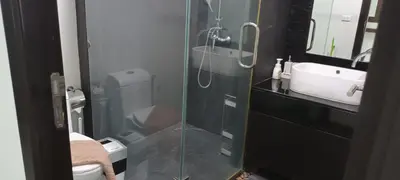 a bathroom with a glass shower and a sink at Luxury spacious 3 bdr apartment Pandora residence in Nai Harn Beach