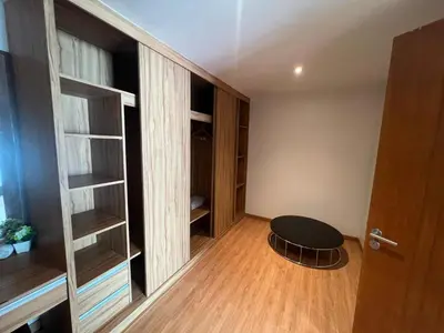 a room with a black stool in a room with shelves at Luxurious 5 Bedroom Condo, private pool, in Patong with Seaview in Patong Beach