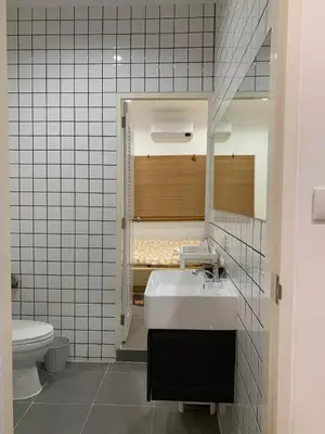 a bathroom with a sink and a toilet and a tub at \u65e5\u5f0f\u5c0f\u9547\u522b\u5885 in Phuket