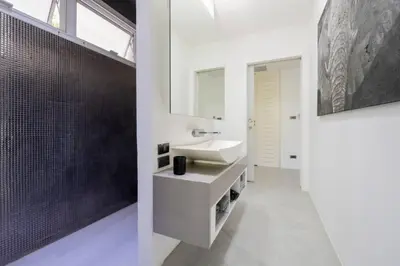a bathroom with a sink and a mirror at New Years Super Fancy 2br Villa near Cafe Del Mar in Kamala Beach