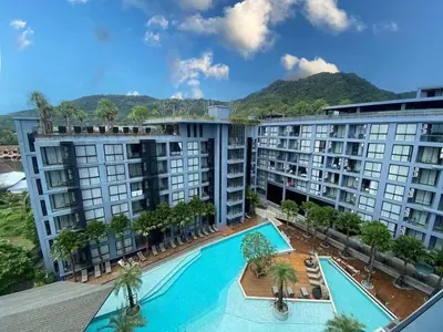 an aerial view of a building with a swimming pool at C225 City Gate Kamala Great facilities 600m to beach in Kamala Beach