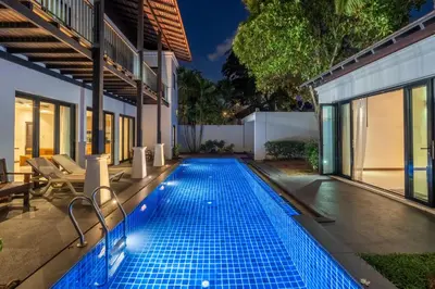 an infinity pool in the backyard of a villa at Pasak Villa in Laguna Phuket