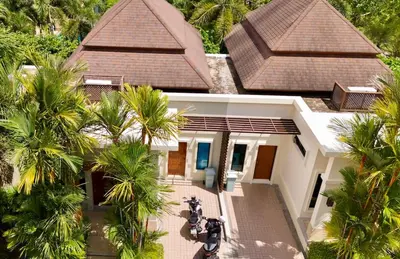 an aerial view of a house with palm trees at Rose Pool Villa The perfect private oasis in Rawai Beach
