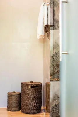 a bathroom with a shower with a wicker basket and towels at Luxury 4 Bedroom Villa 1 Minute from Laguna Phuket in Bang Tao Beach
