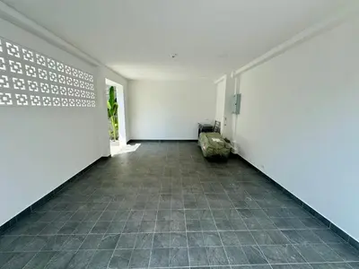 an empty hallway with white walls and a tile floor at Diamond 2 Villa by G Estate Phuket in Ban Saiyuan (1)