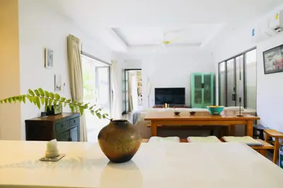 a vase sitting on a table in a living room at Villa Kirana in Rawai Beach
