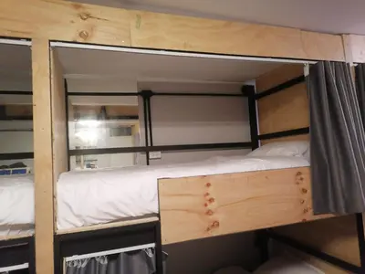a couple of bunk beds in a room at Patong Beach Dream House in Patong Beach