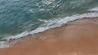 an overhead view of a beach with the ocean at Уютная квартира рядом с пляжем Май Као in Ban Mai Salae
