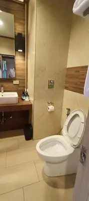 a bathroom with a toilet and a sink at โรงแรมชาวเกาะพีพี Chaokoh Phi Phi Island in Phi Phi Don