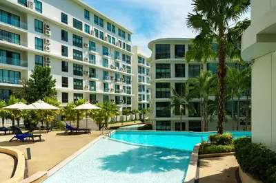 an image of a swimming pool in front of a building at Amazing View Duplex La Vita in Phuket Town
