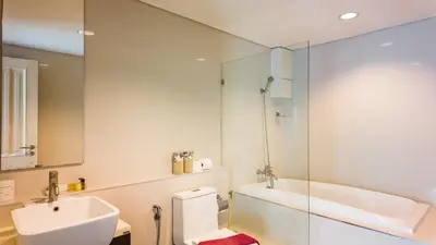 a bathroom with a sink and a toilet and a tub at Apartment 2 bedrooms on Kamala in Phuket Town