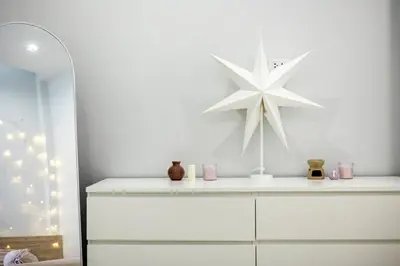 a white dresser with a white star on the wall at SPACIOUS AND BRIGHT 2BR TownHouse7 MonkeyHill in Ban Sam Kong