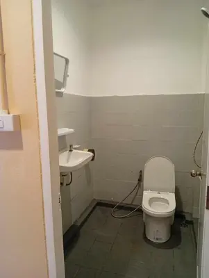 a bathroom with a toilet and a sink at Go To Party Hostel and Bar Aonang in Ao Nang Beach