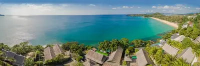 an aerial view of a beach with houses and the ocean at 33 - The Cove in Laem Singh Beach in Surin Beach