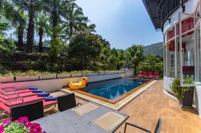a pool with a rubber duck in the middle of a house at Chalong - 10 BR Private Pool Villa - Villa Nap Dau - Phuket in Chalong