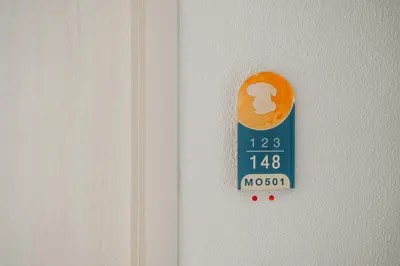 a door knob with a clock on it at Квартира в The Title Halo 1 in Nai Yang Beach