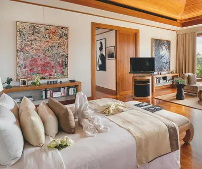 a large bed in a living room with a television at Villa 7 Miramare Andara Signature - The Most Exclusive Villa in Phuket in Amphoe Thalang