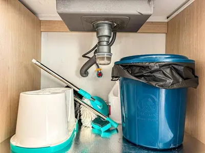 a sink and a trash can under a sink at New 1BDR Fantasea Kamala beach in Kamala Beach