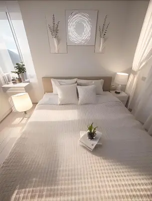 a white bedroom with a large bed with a plant on it at Fab condo in Ban Tha Khreng