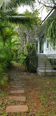 a stone path in front of a house at sengjan garden krabi in Ban Khlong Son