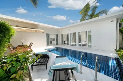 a swimming pool in the backyard of a villa at Brand New 3 Bedroom Pool Villa 18 in Ban Saiyuan (1)