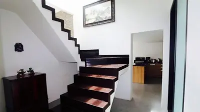 a stairway in a house with a stair case at Villa Loma 3 Chambres in Patong Beach