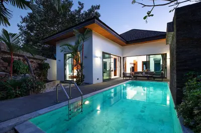 a swimming pool in the backyard of a house at Thai Balinese Villa Rico in Kamala 3BR, Private Pool in Kamala Beach