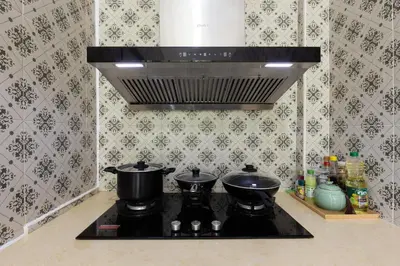 a stove top with two pots on top of it at Phuket Nai Han Beach Villa with Pool in Rawai Beach