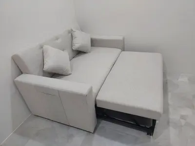 a white couch with two pillows on it at 629 Home for rent, Rawai in Ban Saiyuan (1)