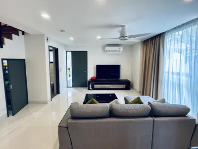 a living room with a couch and a tv at 3bdr Pool Villa Laguna Park-2 in Ban Phru Champa
