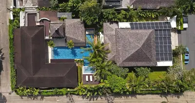 an overhead view of a house with solar panels at Luxury 5 Bedroom Staffed Botanica Villas in Ban Phru Champa