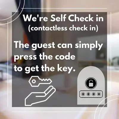 a sign that says were self check in contactless check in at XX GO INN Phuket Patong Beach in Patong Beach