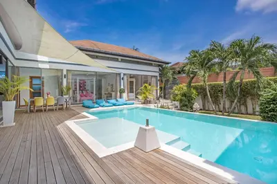 a swimming pool in the backyard of a house at Luxury 4BR Villa Virginie, Salt Pool, Rawai in Rawai Beach