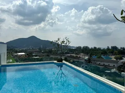 a swimming pool with a view of a city at New 2br apartment -stylish Fantasea Kamala Condo in Kamala Beach