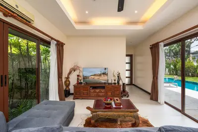 a living room with a couch and a table at Villa Iorangi 3 Bedroom Private Pool in Rawai Beach