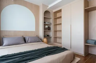 a bedroom with a bed with a large window at Stylish 1 bdr Kamala beach Roof Pool Gym free wifi in Kathu